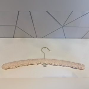 Vintage pale pinky puffy hanger with lace pattern overlay